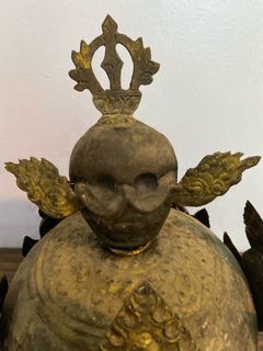 Antique lama helmet made of bronze