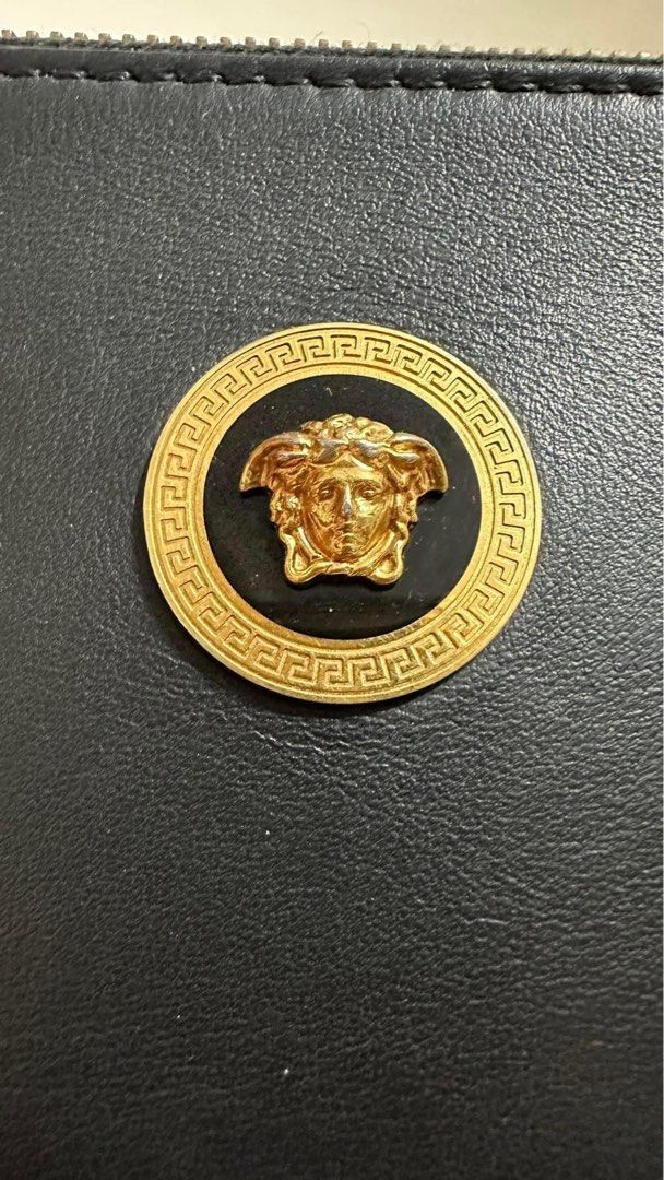 Authentic Versace/marked down (Category: Luxury Bags & Wallets) located in Manila. Submitted by chloe_luxuries (Listing ID 1295297053, Image 3). Description: Guaranteed original Versace wrislet clutch Still in very good condition No inclusion bag only Pm for kore details.