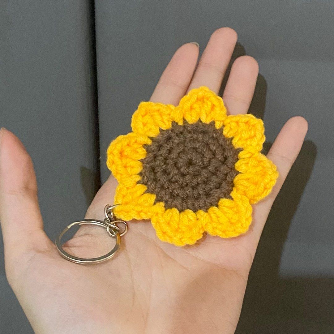 Crochet Sunflower Keychain (Category: Handmade Craft) located in Quezon City. Submitted by madewithmeraki.ph (Listing ID 1295335322, Image 1). Description: 🌻 Less than 10 pieces - ₱80 pesos each 🌻 10-20 pieces - ₱70 pesos each 🌻 21 pieces and above - ₱60 pesos each 🌻 50% non-refundable downpayment required 🌻 5-7 days lead time 🌻 Loc: Project 3, QC.