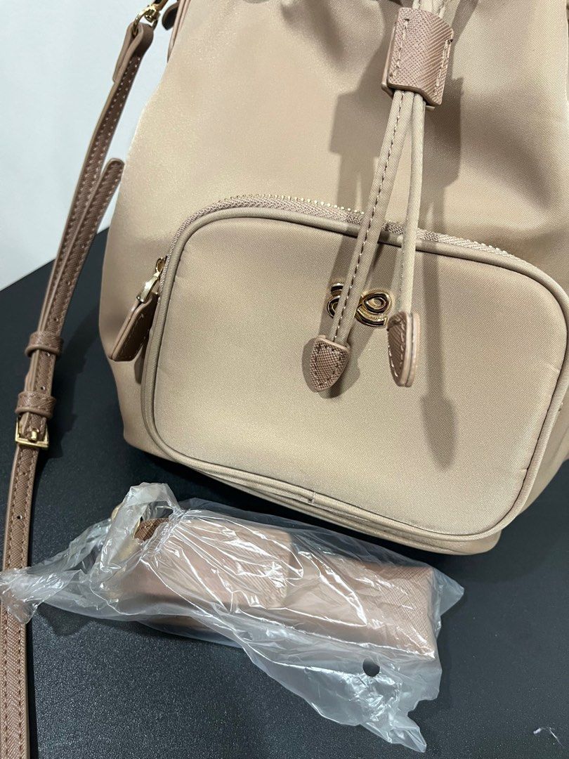 HOLB Bouquet bag Taupe (Category: Cross-body Bags) located in San Juan City. Submitted by aimeeklt (Listing ID 1295318333, Image 2). Description: Brand HOLB Used 3 times only Like new Color Taupe With eco bag.