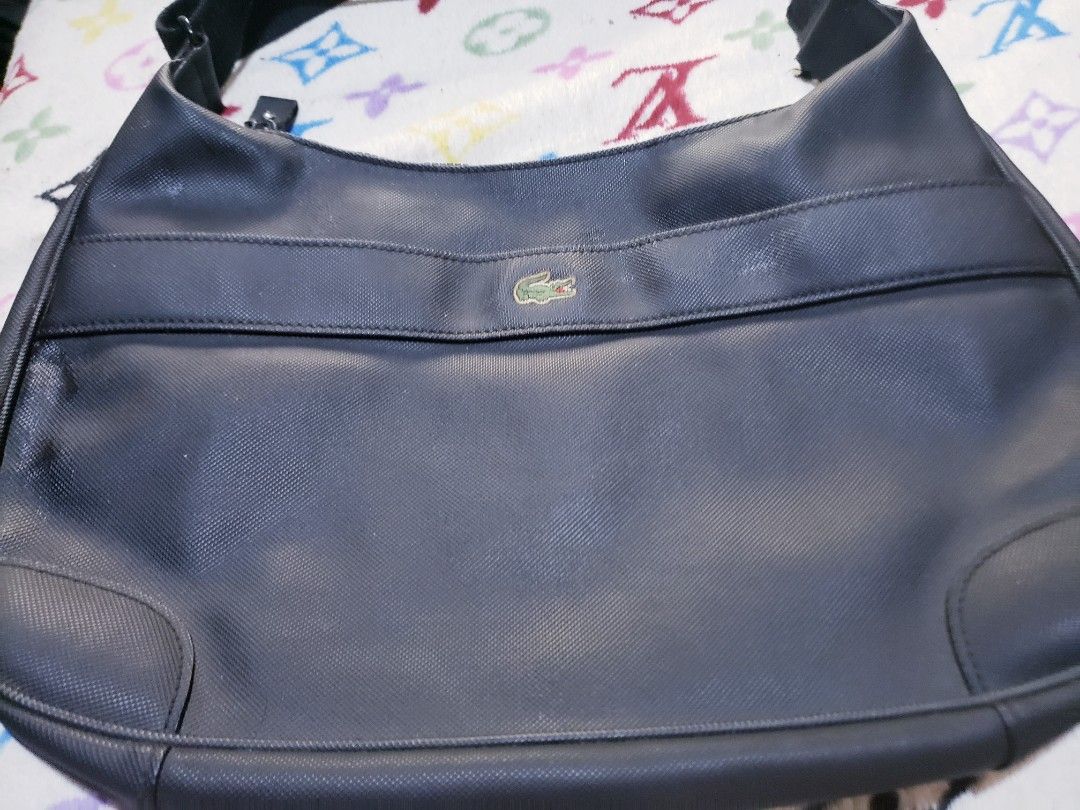 LACOSTE vintage bag (Category: Luxury Bags & Wallets) located in Marikina City. Submitted by racoon143 (Listing ID 1295194202, Image 2). Description: no issue.. slightly negotiable Lacoste vintage handbag, Measurement 16 inches wide and 11 inches tall has normal wear as posted in photos..