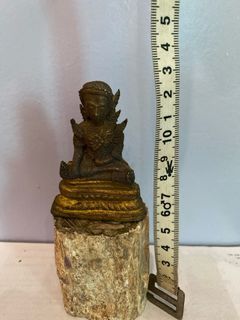 Antique bronze buddha thailand and stone wood