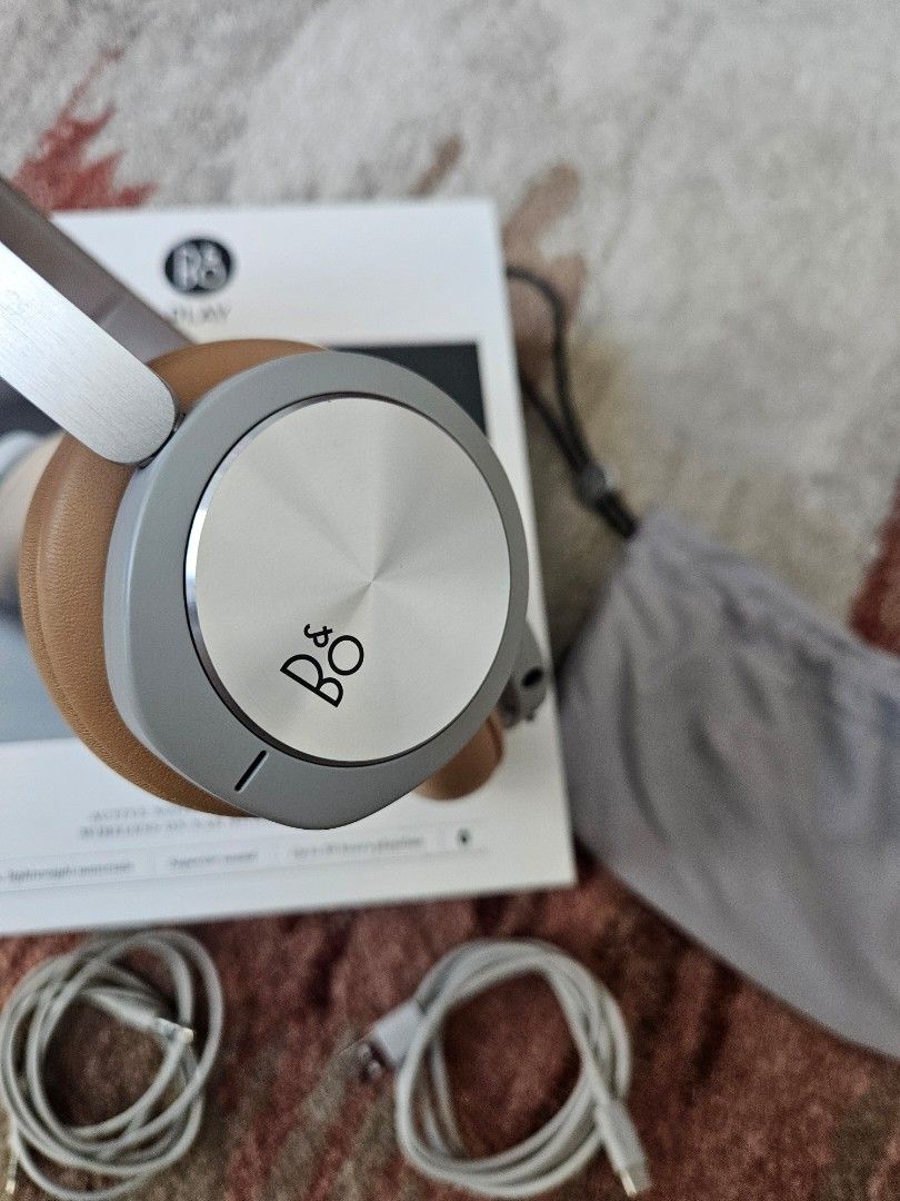 Bang and Olufsen H8i (Category: Headphones & Headsets) located in Taguig. Submitted by rochev (Listing ID 1295397427, Image 2). Description: Premium Bang and Olufsen H8i active noise cancellation wireless on-ear headphones. Up to 30 hours playtime, luxurious lightweight material, superior sound, fashionable. Comes with box, pouch, quick start guide manual, charger wire and speaker wire. Bought in Greenbelt..