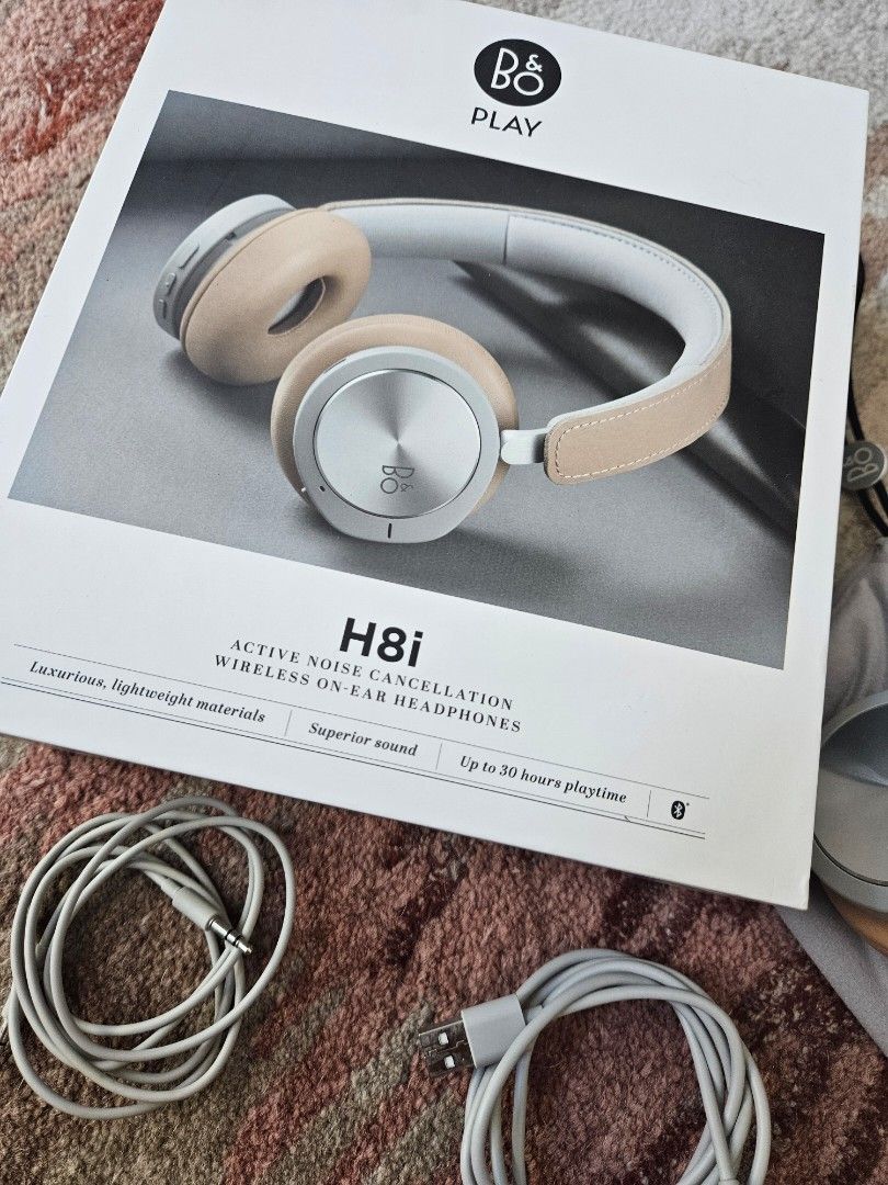 Bang and Olufsen H8i (Category: Headphones & Headsets) located in Taguig. Submitted by rochev (Listing ID 1295397427, Image 3). Description: Premium Bang and Olufsen H8i active noise cancellation wireless on-ear headphones. Up to 30 hours playtime, luxurious lightweight material, superior sound, fashionable. Comes with box, pouch, quick start guide manual, charger wire and speaker wire. Bought in Greenbelt..