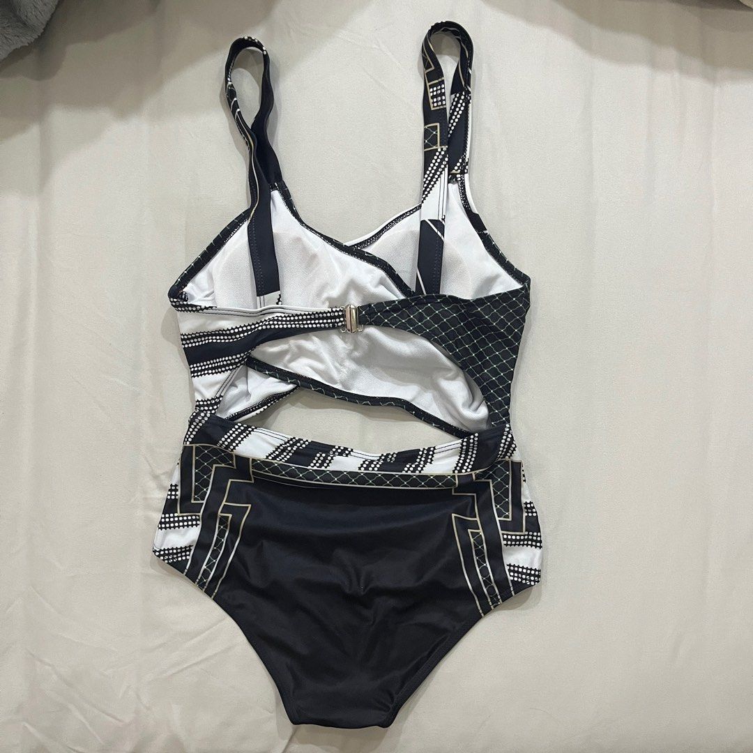 Black & White One Piece Cut Out Swimsuit (Category: Bikinis & Swimsuits) located in Manila. Submitted by redregistry (Listing ID 1295440998, Image 2). Description: - Never Used.
