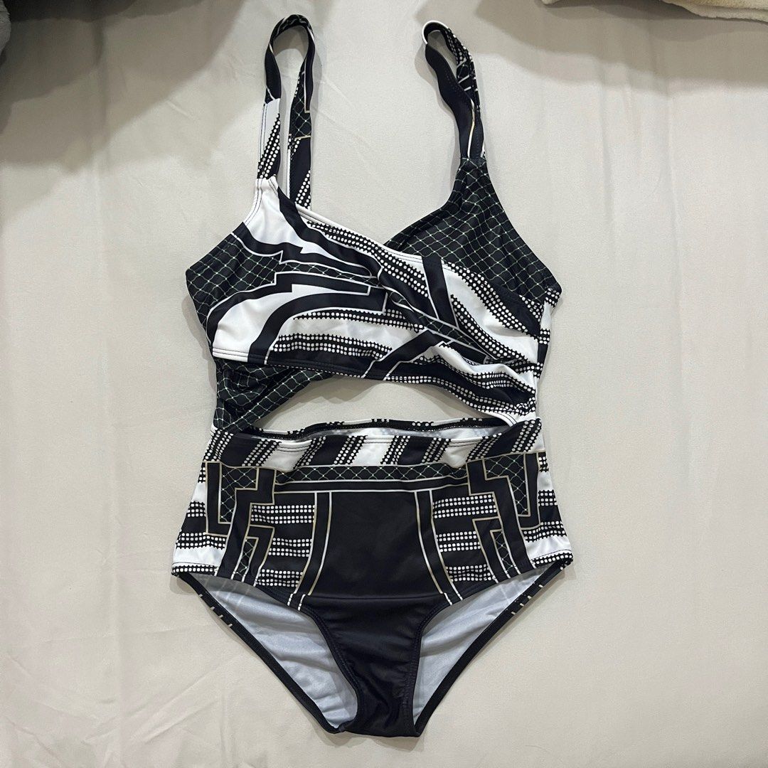 Black & White One Piece Cut Out Swimsuit (Category: Bikinis & Swimsuits) located in Manila. Submitted by redregistry (Listing ID 1295440998, Image 1). Description: - Never Used.