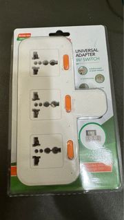 Omni adaptor with individual switch brand new sealed