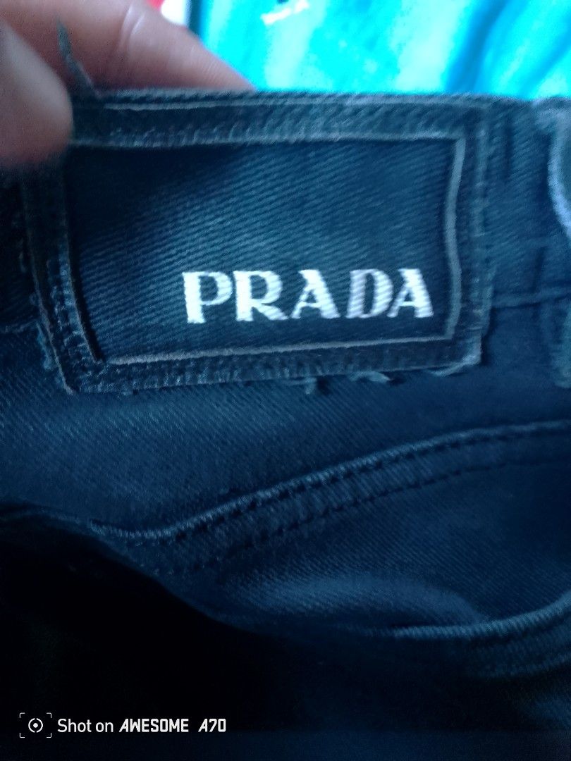 PRADA (Category: Luxury Apparel) located in Pasig City. Submitted by michelle.asuki (Listing ID 1295357306, Image 3). Description: PRADA BLACK JEANS ISSUE SEE PIC SIZE 34 LENGHT 38 HEM 7 800.