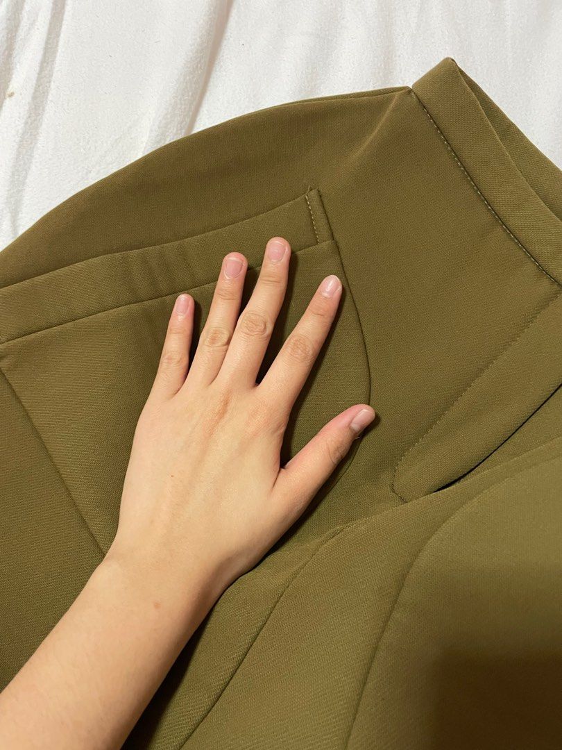 Rumba Army Green Skirt (Category: Skirts) located in Manila. Submitted by zunigae (Listing ID 1295449014, Image 2). Description: Please manage your expectations. Color of the item may change due to lighting and filter. No when worn pictures. Buyer can request for more pictures of the item if needed. Shipping fee will be shouldered by the buyer. Shipping will be based on the weight of items and preferred shipping courier. For Grab, Angkas and Lala