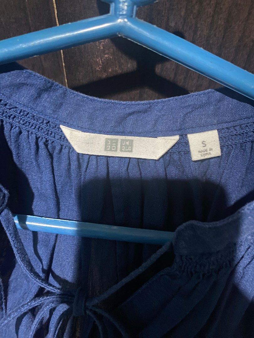 Uniqlo blouse (Category: Blouses) located in Manila. Submitted by chemit97 (Listing ID 1295359072, Image 2). Description: Authentic garment Please manage your expectation since this is stored inside the cabinet for quite some time.
