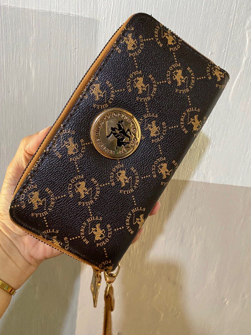 Beverly hills polo club (Category: Luxury Bags & Wallets) located in Tarlac. Submitted by browna9 (Listing ID 1295541837, Image 1). Description: Auth polo club 2 zip wallet Almost new Naka stock lang Free ship via j&t Bagsak presyo.