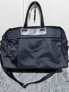 Black duffel bag (no brand)
