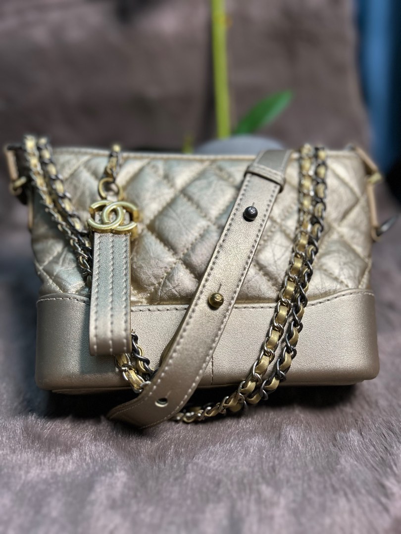 Chanel gabrielle gold top