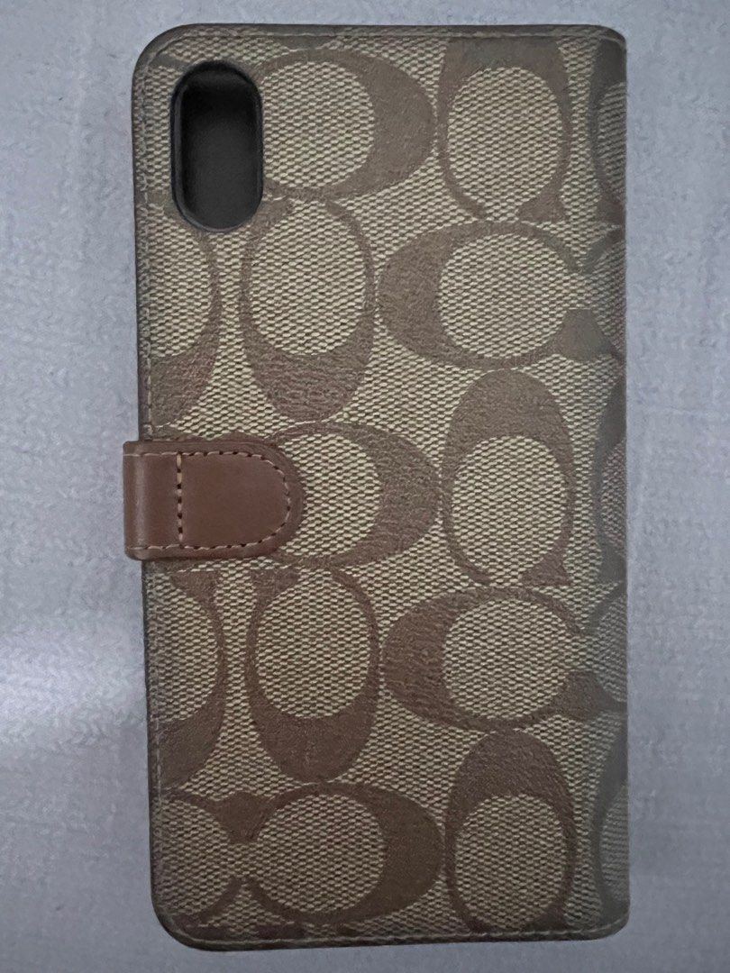 Coach iPhone Xs Max leather case (Category: Cases & Sleeves) located in Quezon City. Submitted by rhodora1224 (Listing ID 1295679775, Image 2). Description: Original Coach. Bought from Coach store in NYC, USA Last price…originally selling it for P1,000.00 .