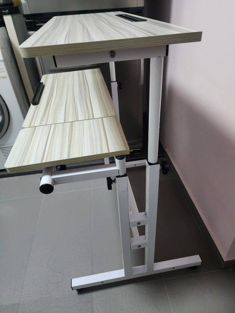 Computer Table (Category: Tables & Sets) located in Singapore. Submitted by jaslyn_chua (Listing ID 1295662958, Image 3). Description: Computer Table with Tiltable Keyboard Rest for Bedroom Living Room Study Room Work Desk Pine colour, Dimension: 80cm by 30 cm.