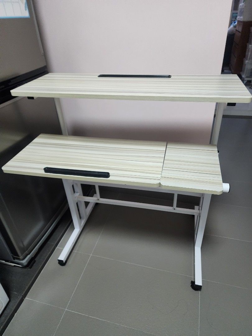 Computer Table (Category: Tables & Sets) located in Singapore. Submitted by jaslyn_chua (Listing ID 1295662958, Image 2). Description: Computer Table with Tiltable Keyboard Rest for Bedroom Living Room Study Room Work Desk Pine colour, Dimension: 80cm by 30 cm.