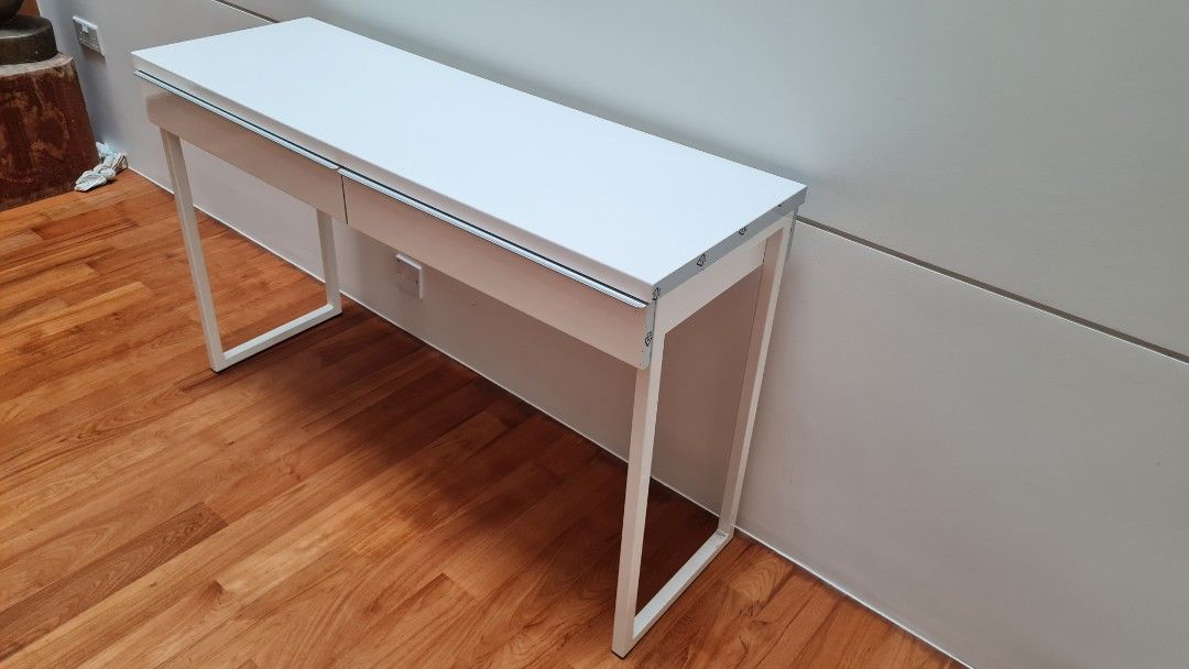 IKEA Study Table (Category: Tables & Sets) located in Singapore. Submitted by tansam2011.1 (Listing ID 1295525451, Image 2). Description: Superbly good condition study table with 2 drawers. Complimentary delivery..