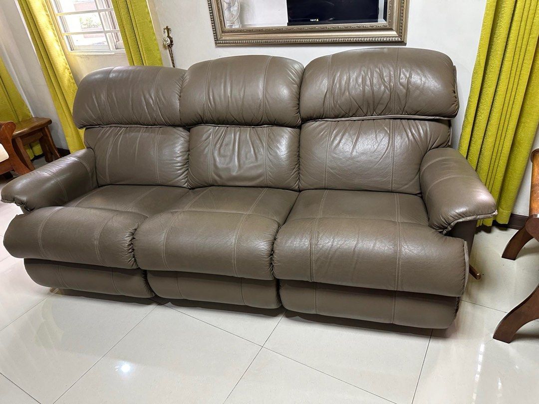 LAZBOY Premium 3 Seater Reclining Sofa - Authentic (Category: Sofas) located in Quezon City. Submitted by arthurion (Listing ID 1295606314, Image 3). Description: Genuine LazBoy 3 Seater Premium Sofa Bought at P165,000 SRP (2021) at LazBoy SM North Edsa Quality and Condition is still excellent. Authenticity can crosscheck at the store. .