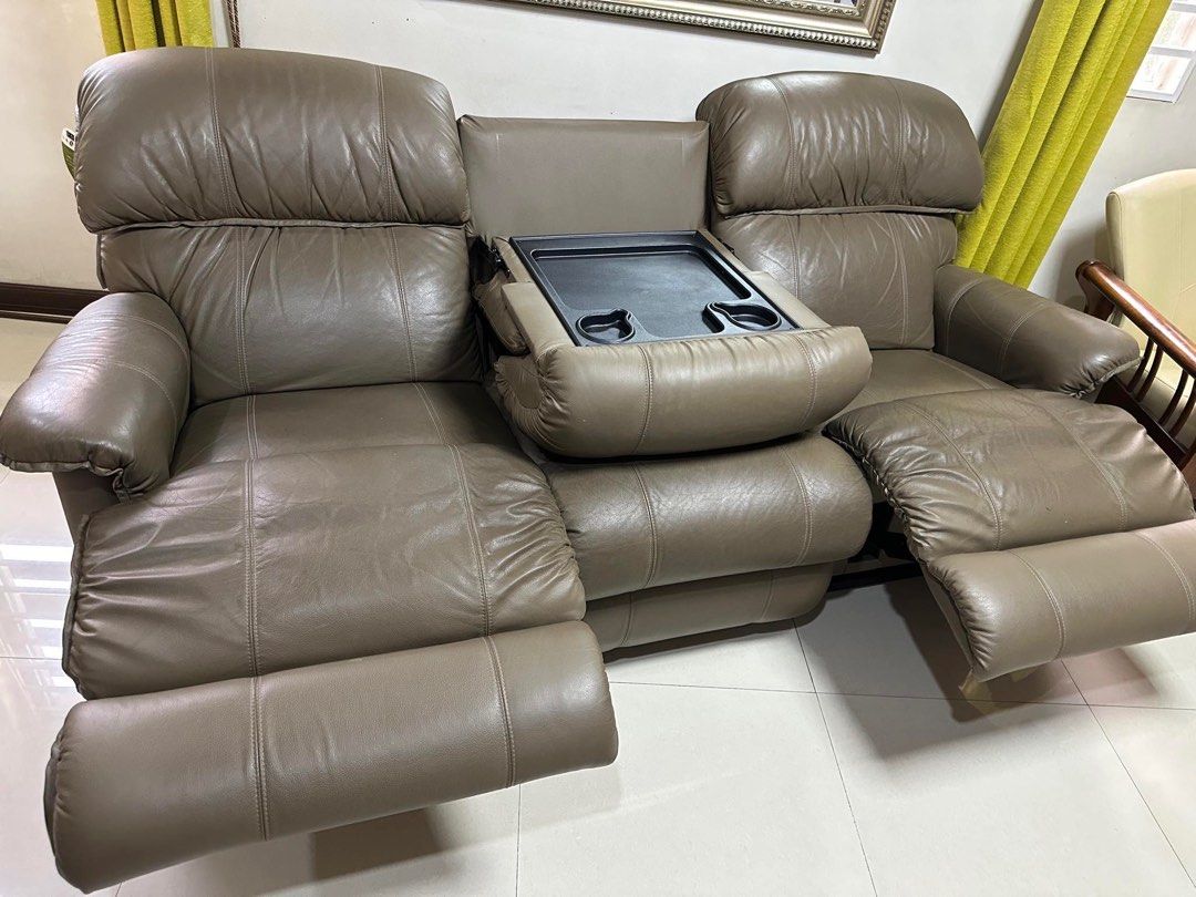 LAZBOY Premium 3 Seater Reclining Sofa - Authentic (Category: Sofas) located in Quezon City. Submitted by arthurion (Listing ID 1295606314, Image 1). Description: Genuine LazBoy 3 Seater Premium Sofa Bought at P165,000 SRP (2021) at LazBoy SM North Edsa Quality and Condition is still excellent. Authenticity can crosscheck at the store. .