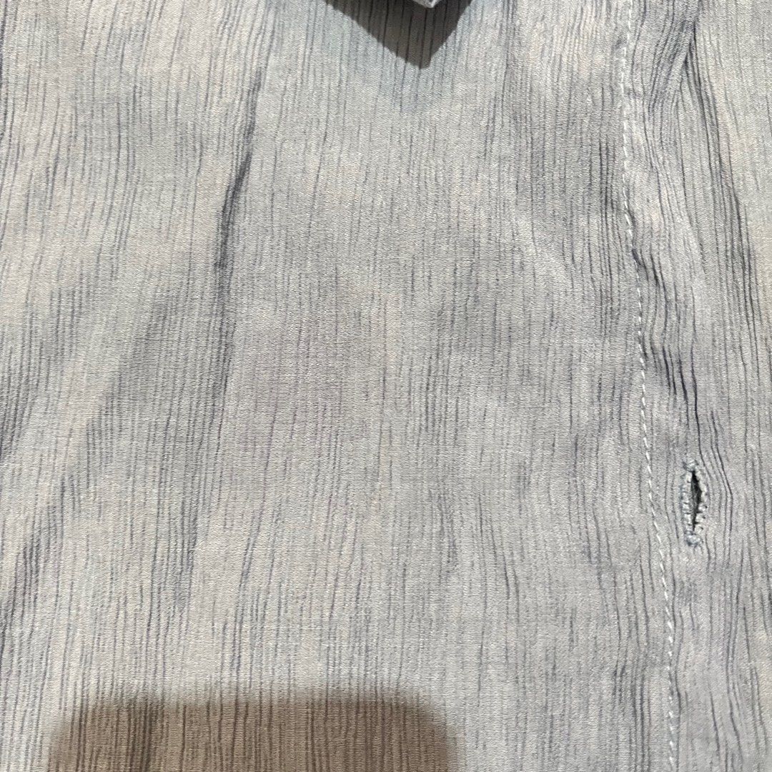 light blue polo with crinkled fabric (Category: Longsleeves) located in Manila. Submitted by basicbaguette (Listing ID 1295582185, Image 2). Description: very cute polo with crinkled fabric fits xs to s length is a bit long.