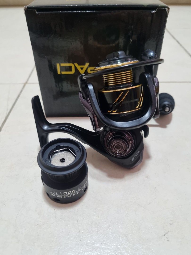 Fishing Spinning luring reel size 1000 with spare spool (not rod