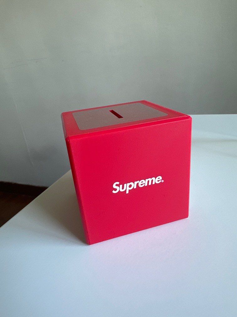 Supreme coin box