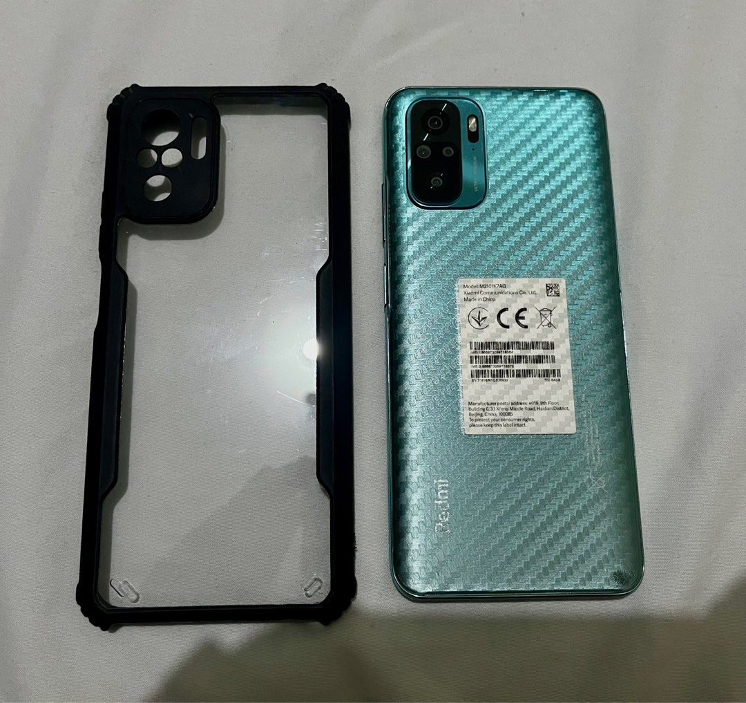 Xiaomi Redmi Note 10 (Category: Xiaomi) located in Mandaluyong City. Submitted by owlsandrockets (Listing ID 1295659822, Image 1). Description: Xiaomi Redmi Note 10 64gb Dual sim Openline. Phone itself is smooth to use. No internal issues. May basag lang screen protector pero hindi yung mismong phone and yung back cover sa lower right part, may di pantay na kulay. RFS: iPhone user. Spare phone ko lang ito. .