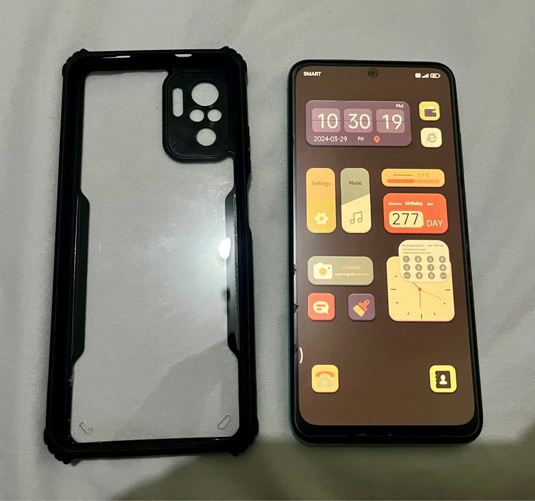 Xiaomi Redmi Note 10 (Category: Xiaomi) located in Mandaluyong City. Submitted by owlsandrockets (Listing ID 1295659822, Image 2). Description: Xiaomi Redmi Note 10 64gb Dual sim Openline. Phone itself is smooth to use. No internal issues. May basag lang screen protector pero hindi yung mismong phone and yung back cover sa lower right part, may di pantay na kulay. RFS: iPhone user. Spare phone ko lang ito. .