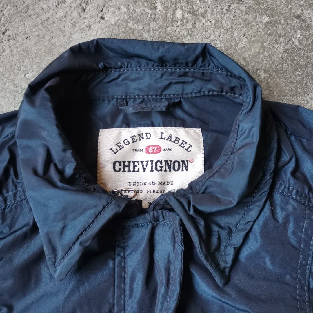 Chevignon Nylon Cargo Biker Jacket (Category: Coats, Jackets and Outerwear) located in Rodriguez. Submitted by tygryskus_picks (Listing ID 1290971698, Image 3). Description: Nylon Material Leather Trimmings has wire on every corner to alter the fit Width - 16" Length - 23.5".