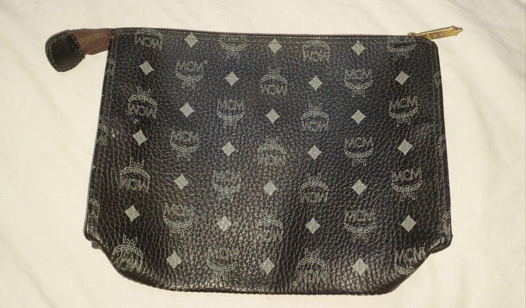 MCM Clutch Bag (Category: Luxury Bags & Wallets) located in Polomolok. Submitted by dkljapansurplus (Listing ID 1290955822, Image 2). Description: Mcm Pouch from japan In a good condition Freeshipping Nationwide.