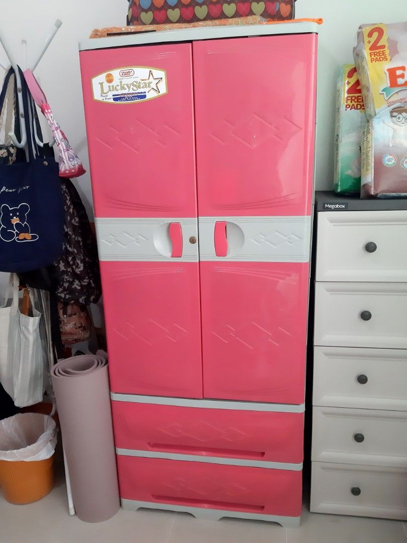 Zooey Cabinet (Category: Shelves, Cabinets & Racks) located in San Jose del Monte. Submitted by lenlawliet (Listing ID 1290844868, Image 1). Description: ✔ Color pink minimalist design ✔ With defective lock and key steel support, but can still be fixed ✔ Made of quality plastic ✔ Space saver ✔ Used but not abused, in good condition ✔ Good as new lalo kapag nalinisan👌 ✔ Perfect for those who are renting an apartment ✔ Contents are not included Re