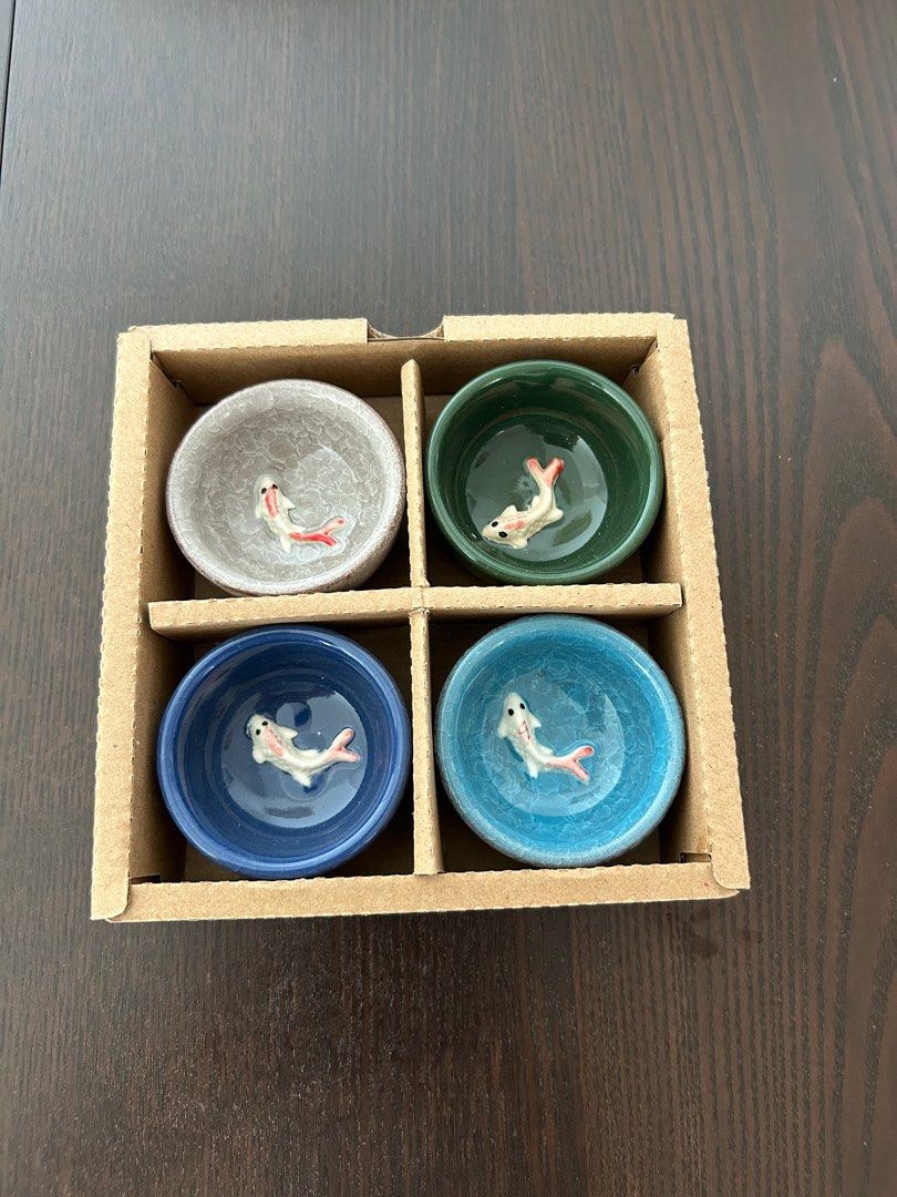 tableware (Category: Coffee & Tea Tableware) located in Singapore. Submitted by kdbus (Listing ID 1290862916, Image 3). Description: Set of Chinese tea cups ( 4 cups per set). Koi fish design. Total of 2 sets for sale with colours as shown in pictures. Cash and collect from lift land of Blk 130B. Lorong 1. Toa Payoh. Singapore 312130 $10 per set.