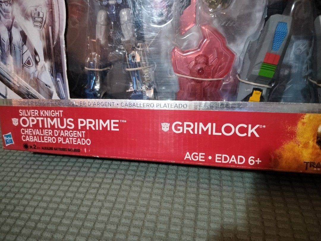 Transformers 4 Silver Knight Optimus Prime And Grimlock (Category: Figurines & Statues) located in Quezon City. Submitted by dvsharks (Listing ID 1290916212, Image 3). Description: Transformers 4:Age of Extinction 2-pack Silver Knight Optimus Prime Grimlock Misb Box not mint Shipping: Buyer pays first (Gcash/Bdo) Shipping fee shouldered by buyer Lalamove, Grab Pabili.
