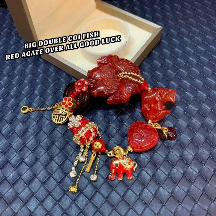 Big double coi fish bracelet (Category: Bracelets) located in Manila. Submitted by delynonlineshopping_ (Listing ID 1295831307, Image 2). Description: 💥 NEW ARRIVAL POST 💚 BIG DOUBLE COI FISH RED AGATE OVER ALL GOOD LUCK CHARM BRACELET 💚 🧧 COI FISH = This Coi Fish symbol has long been associated with abundance and wealth in feng shui, thus there are many cures that depict fish for prosperity. However, there are different types of fish used in