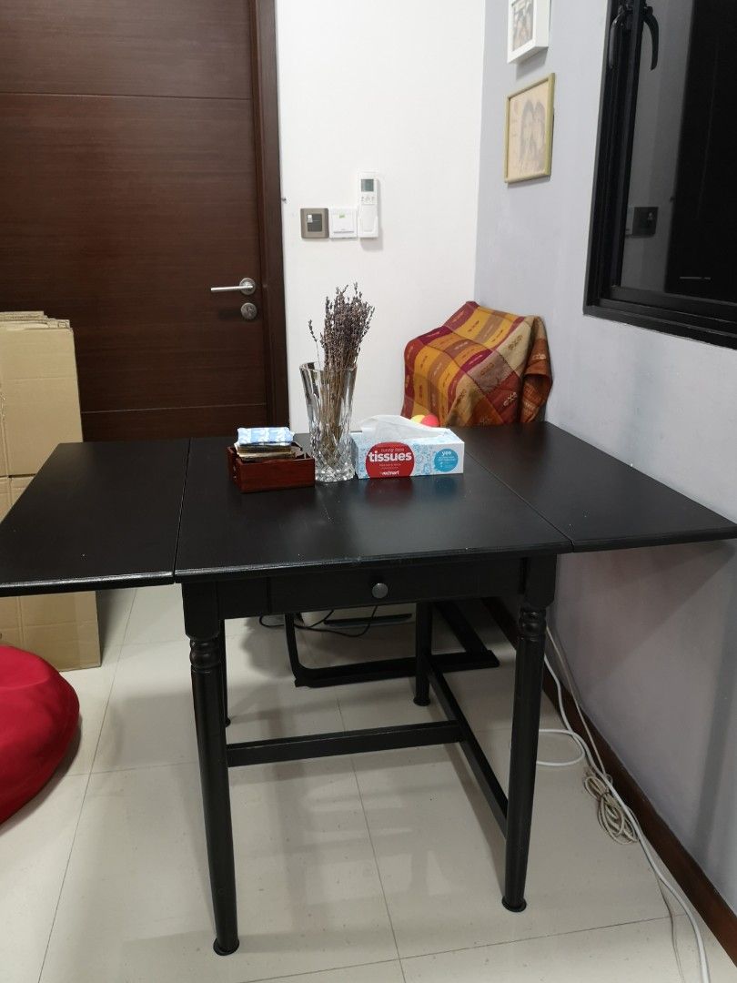Dining Table Set (Category: Tables & Sets) located in Singapore. Submitted by chenmelody2 (Listing ID 1295725204, Image 1). Description: Giving away Ikea dining set. 1) extendable dining table x 1 (max 120x 80x75 cm) 2) black chair x 2 Pick up April 6, 9am. 398371..