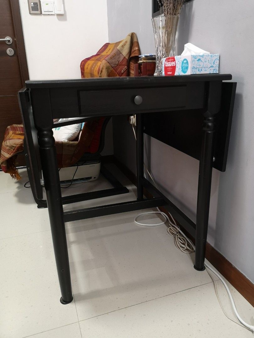 Dining Table Set (Category: Tables & Sets) located in Singapore. Submitted by chenmelody2 (Listing ID 1295725204, Image 3). Description: Giving away Ikea dining set. 1) extendable dining table x 1 (max 120x 80x75 cm) 2) black chair x 2 Pick up April 6, 9am. 398371..