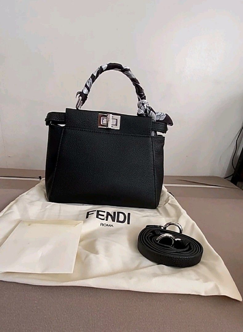 Fendi Mini Peekaboo (Category: Luxury Bags & Wallets) located in Makati City. Submitted by xie10474 (Listing ID 1295760249, Image 2). Description: Genuine Pebbled Leather Coded, with Care card and Dust bag No flaws, no issues Minimal hair line on twist-lock Japan-sourced RFS: Decluttering.