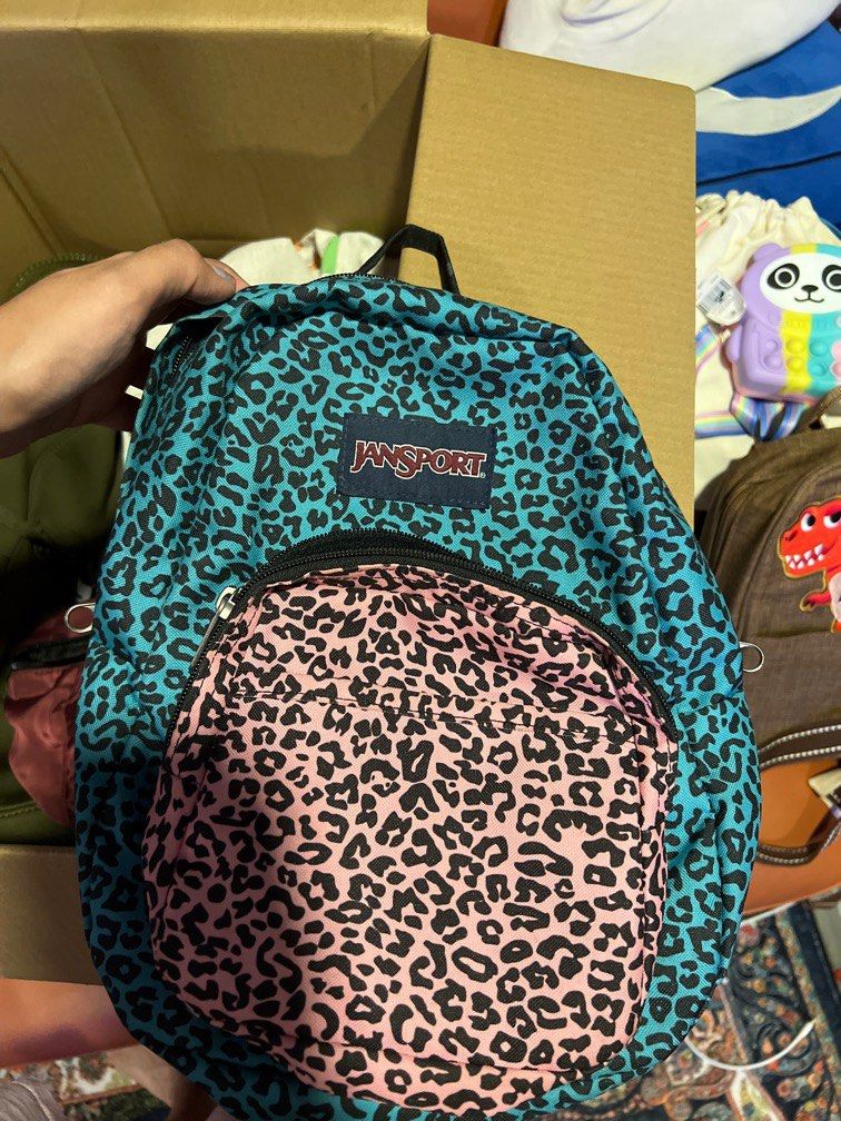 jansport animal print backpack SuperBreak Plus with Padded 15-inch Laptop Sleeve and Integrated Bottle Pocket - Spacious and Durable Daypack for Work and Travel the JanSport Half Pint is the perfect throw Jansport Superbreak Plus Leopard Backpack
