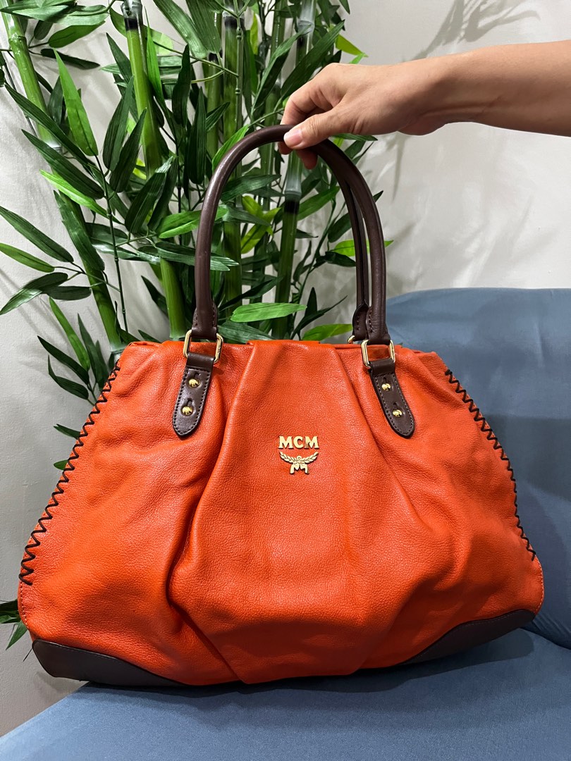 MCM orange shoulder bag tote Luxury Bags Wallets on Carousell