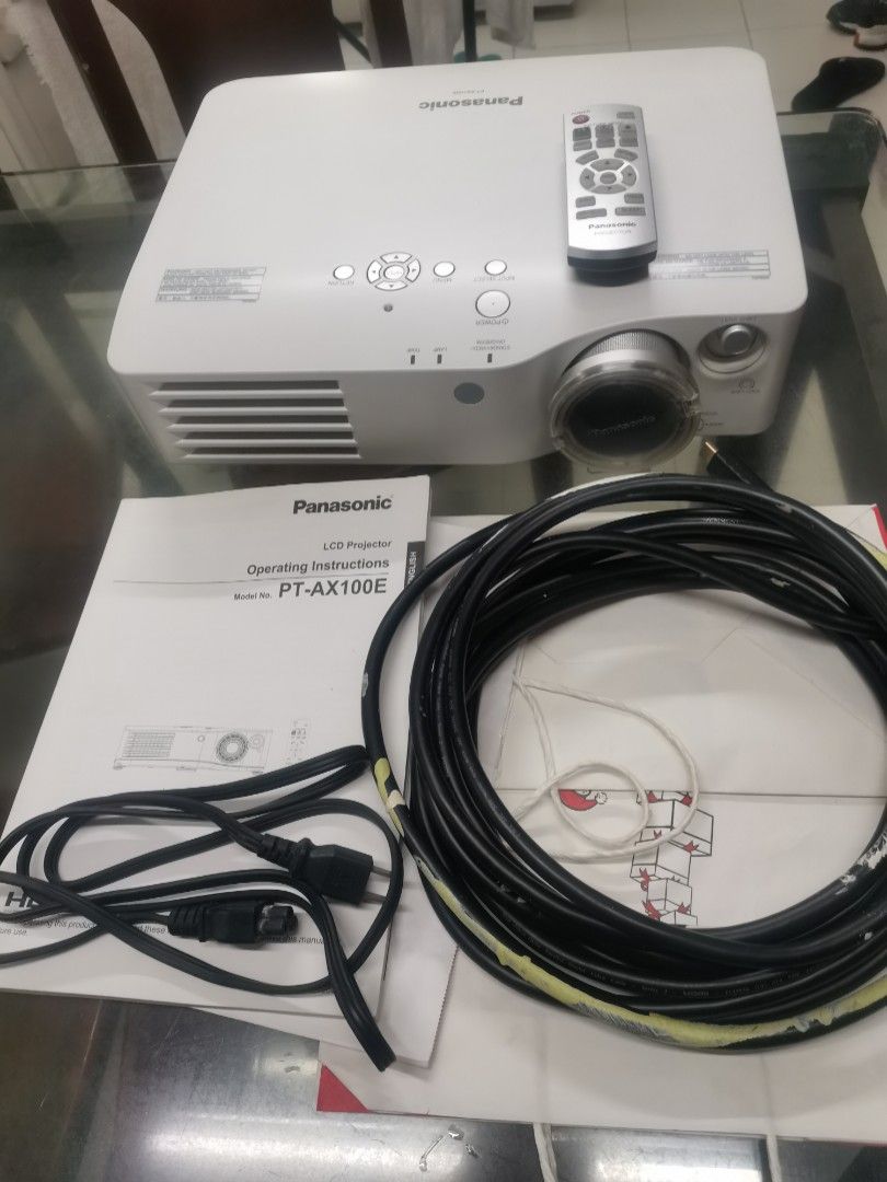 Panasonic PT-AX100E Home Theatre Projector (Category: Projectors) located in Manila. Submitted by butchpacheco2014 (Listing ID 1295726487, Image 1). Description: Up for sale is a well taken care of Panasonic HT Projector. It was installed in an air conditioned room hence ( just recently removed) not subjected to heat and dust. This one is built for Home Theater set up with a decent brightness of 2000 rated ANSI lumens. It can project from 40 to 2