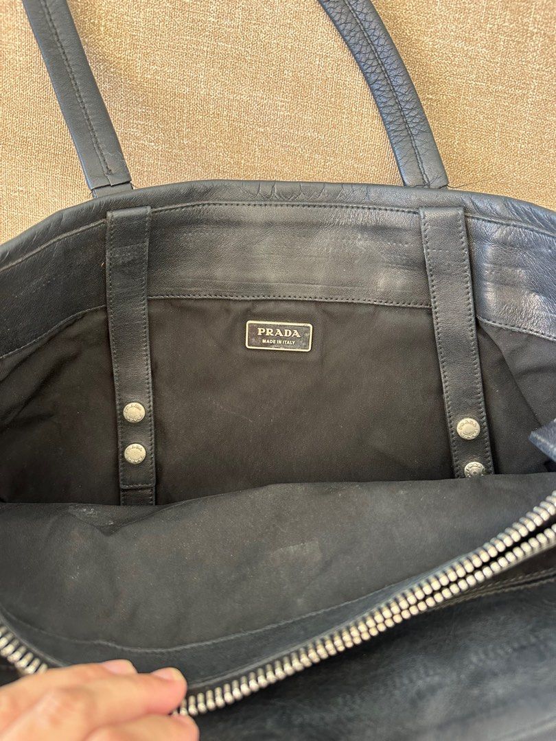 Prada laptop bag with dustbag (Category: Luxury Bags & Wallets) located in Manila. Submitted by shop.ela (Listing ID 1295723979, Image 3). Description: Havent been using this since I moved to an island .