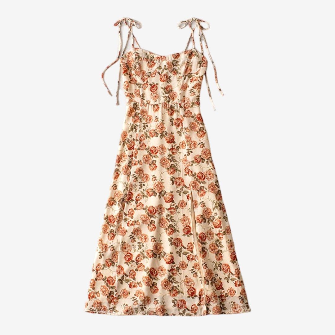 Rose Printed Camisole Dress (Category: Dresses) located in Caloocan City. Submitted by shopfab. (Listing ID 1295771084, Image 1). Description: midi length dress with a sweetheart neckline, tie straps and side slit S: Bust=72cm; Length=96cm; Waist=62cm; used once no flaws, like new rfs: decluttering.