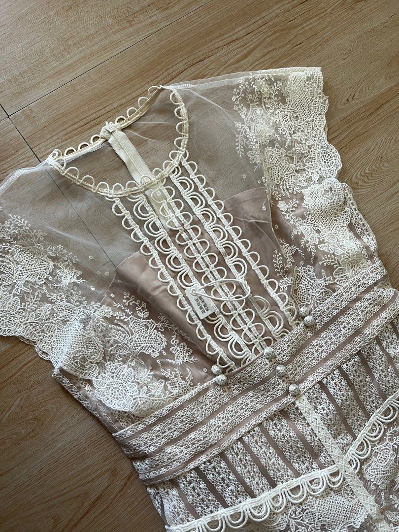 While Lace Dress XL (Category: Dresses) located in Quezon City. Submitted by ronabouts (Listing ID 1295762757, Image 2). Description: Originally priced at 2,500 Fits M-L even if size is XL Very elegant lace dress Measurement on Flat lay: Shoulder to Shoulder- 23 inches Chest- 18 inches Waist- 15 1/2 inches Hips- 18 inches Length- 46 inches.