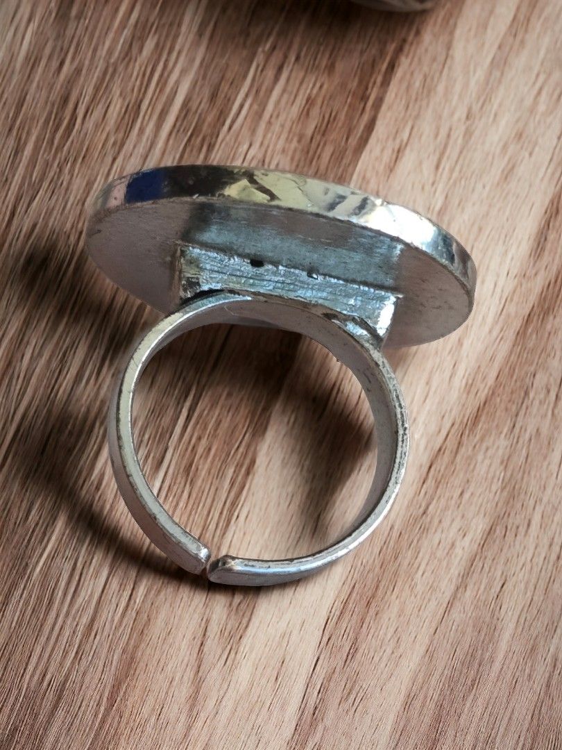 Dior Button Ring (Category: Luxury Accessories) located in Pasig City. Submitted by kimjayson (Listing ID 1295879459, Image 2). Description: Vintage Rare Dior Button Ring size - Adjustable back meet up - Tiendesitas / SM Center Pasig Delivery - Lalamove/Grab payment - Gcash/BPI ( Payment upon picking up and verifying with your rider that the item is correct and as posted..