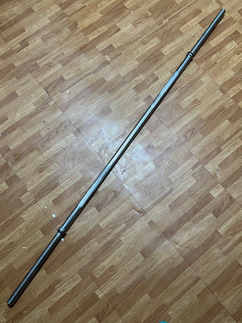 Long Barbell Bar with FREE 2 Barbell Clamps (Category: Weights & Dumbbells) located in Dasmarinas. Submitted by fancy_styleph (Listing ID 1296019721, Image 2). Description: ►Long barbell bar with 2 spin lock collars (5 FT) • Used for bench press, squats, deadlifts, bicep curl and military press • This standard 5-foot bar is made of solid steel with threaded ends and finished with a chrome coating • Accommodates 1 inch plates – Designed with a 1-i