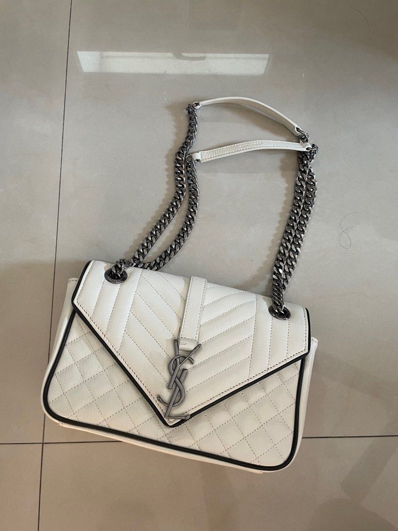 Saint Laurent YSL Grained Tri-Quilt Chain Bag (Category: Luxury Bags & Wallets) located in Quezon City. Submitted by _bellec (Listing ID 1295957439, Image 3). Description: Calfskin medium size Size Base length: 9.25 in Width: 2.50 in Height: 6.00 in Drop: 12.00 in With dustbag.
