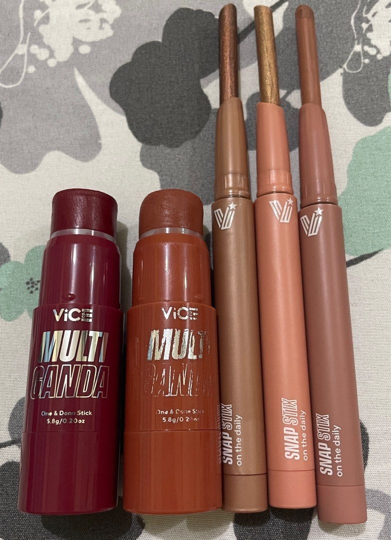 VICE Cosmetics (part 1) (Category: Makeup) located in San Mateo. Submitted by ryubelle (Listing ID 1293344842, Image 2). Description: • One & Done Stick - Berry Good (₱300) • One & Done Stick - Peachy Peachy (₱300) • Everlastint - Ever After (₱345) (never been used!) • Lip Glozzz - Boombells (₱195) (never been used!) • Glazzting Lip Stain - Rock on Red (₱90) • Glazzting Lip Stain - Peace Out Pink (₱90) • Snap Stix - Gilded (₱189) - (never been us