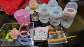Bottles , teether and container