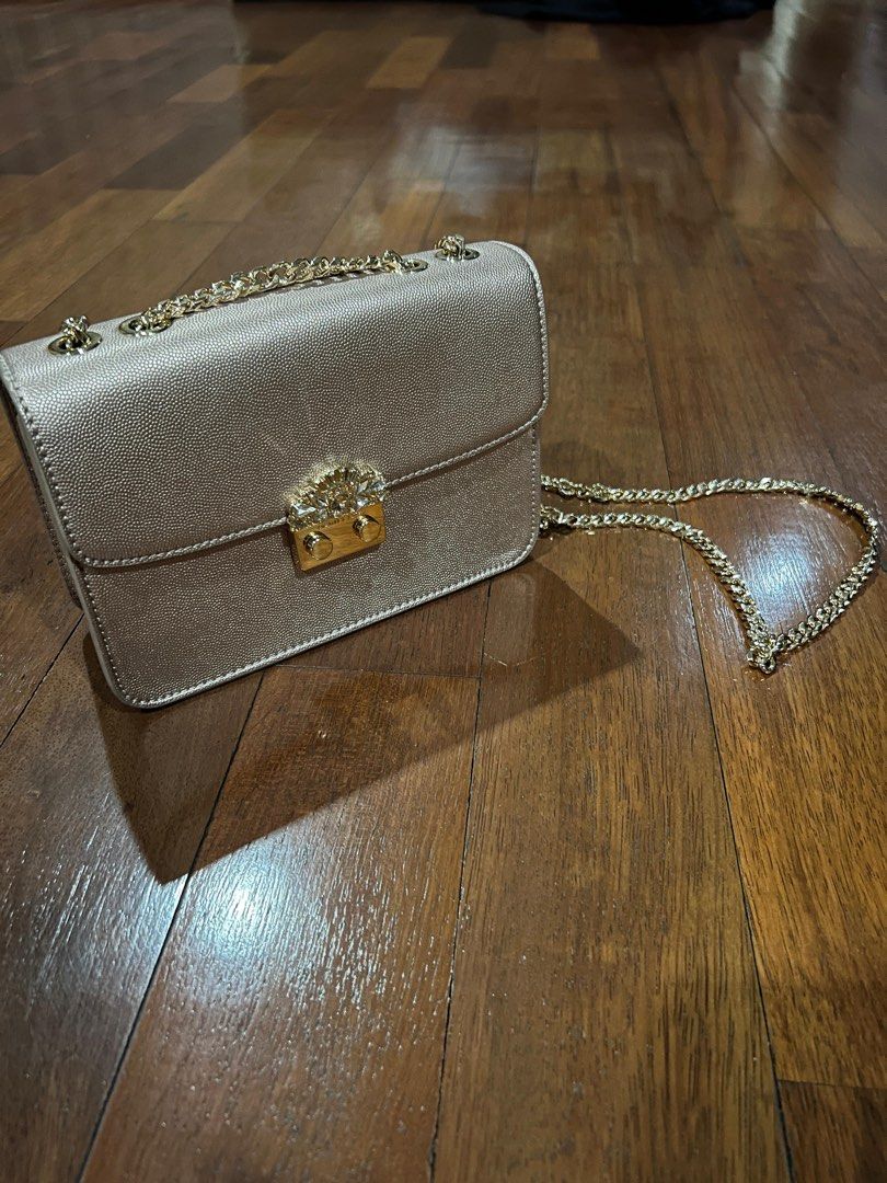 Embellished push top lock clutch