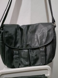 Coach soft leather  laptop sling messenger bag like new .